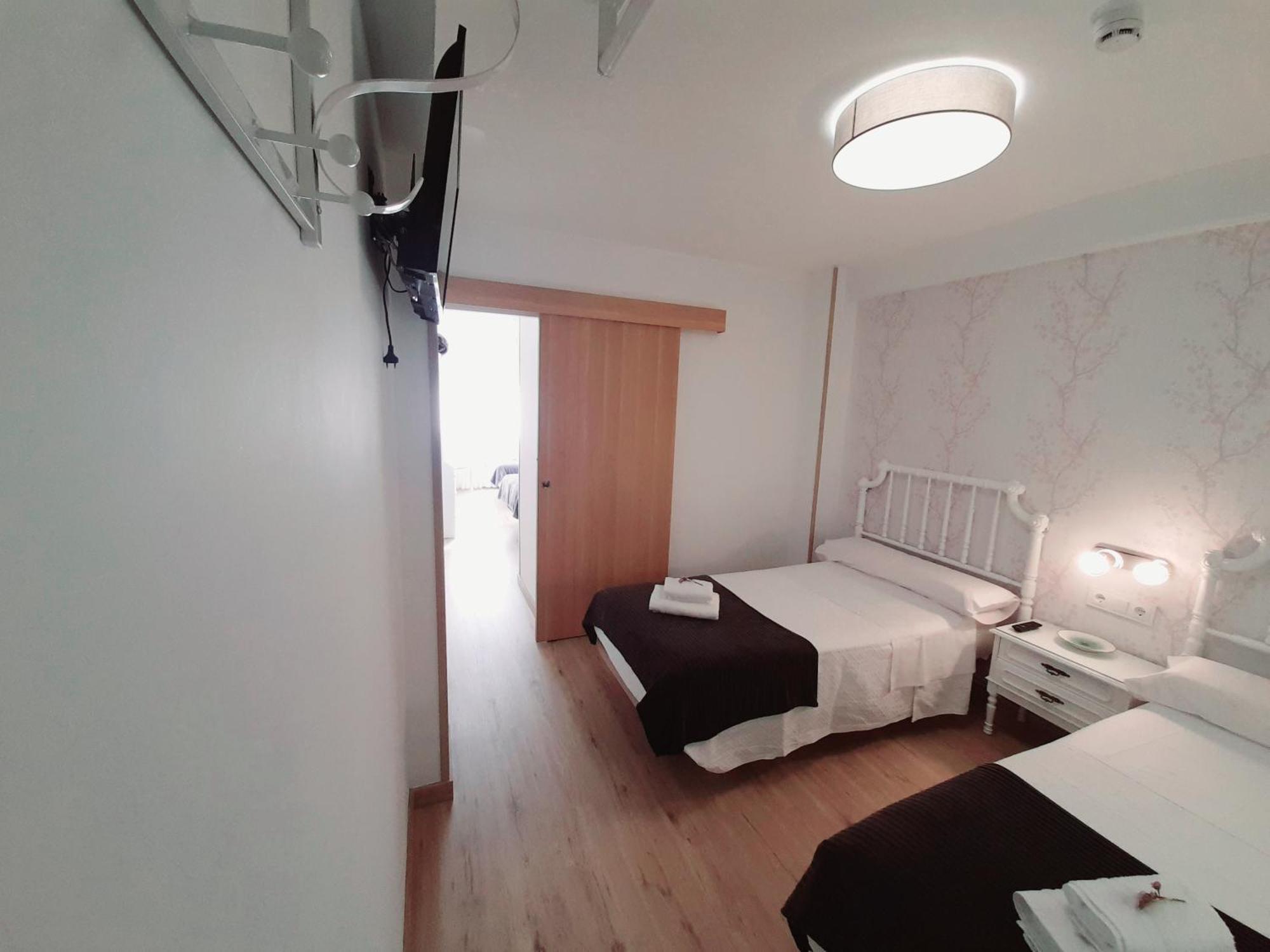 Pension Ferradura Melide Chambre photo